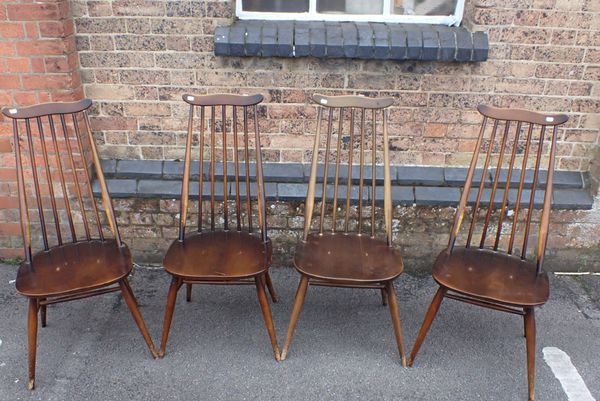 A SET OF  FOUR ERCOL DARK FINISH HIGH BACK CHAIRS