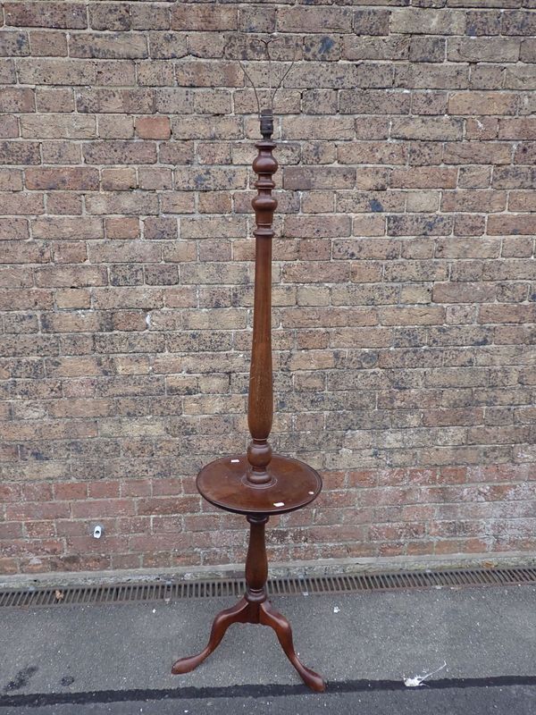 A 1920S MAHOGANY STANDARD LAMP