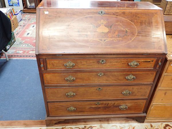 A MAHOGANY BUREAU WITH MARQUETRY FALL