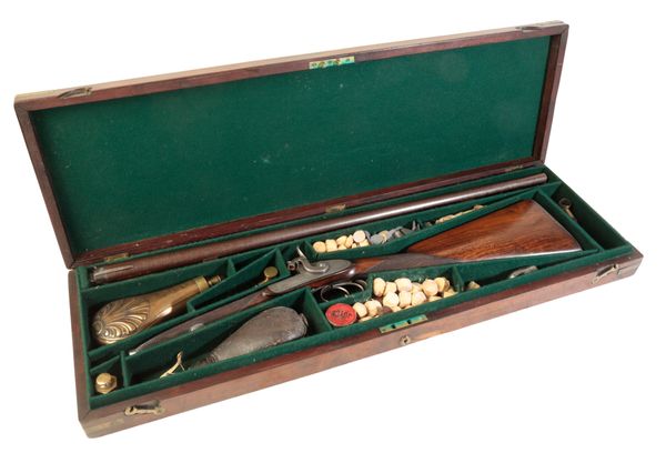 A 19TH CENTURY DOUBLE BARRELLED PERCUSSION SHOTGUN