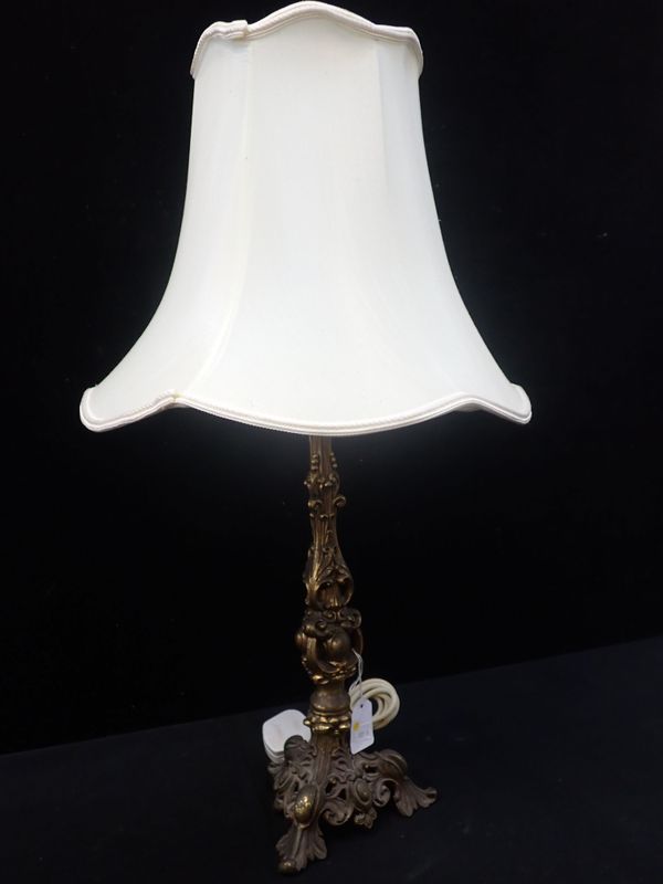 A GILT METAL ROCOCO STYLE TABLE LAMP