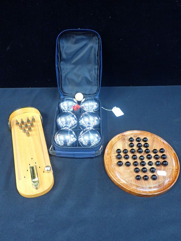 A MINIATURE TEN PIN SKITTLE GAME