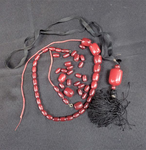 A 'CHERRY AMBER' STYLE GRADUATED BEAD NECKLACE