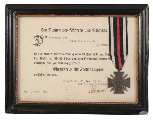 A GERMAN HINDENBERG HONOUR CROSS MEDAL WITH SWORDS