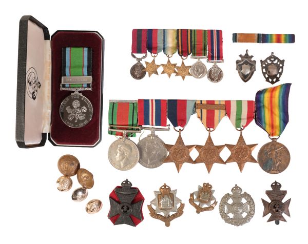 A COLLECTION OF MEDALS AND BADGES