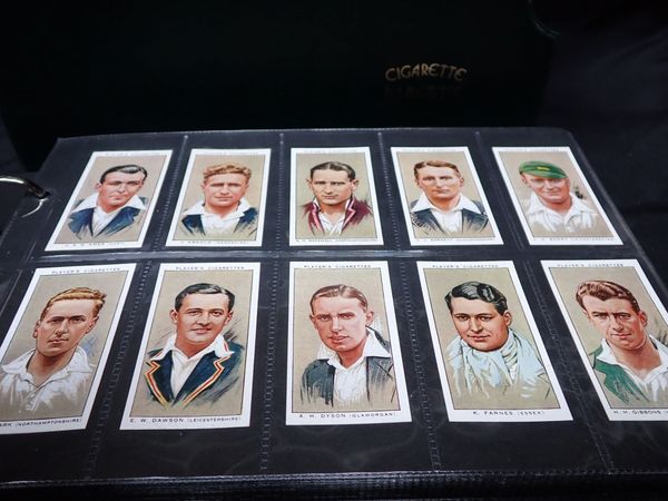 AN ALBERT’S GREEN VINYL CIGARETTE CARD ALBUM