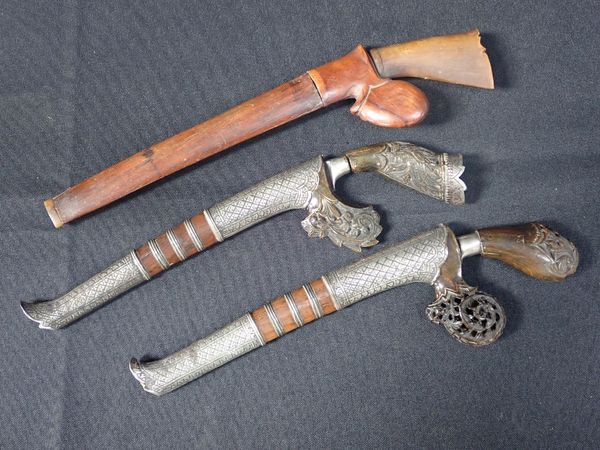 TWO SIMILAR INDONESIAN SEWAR DAGGERS, MALAY OR SUMATRA