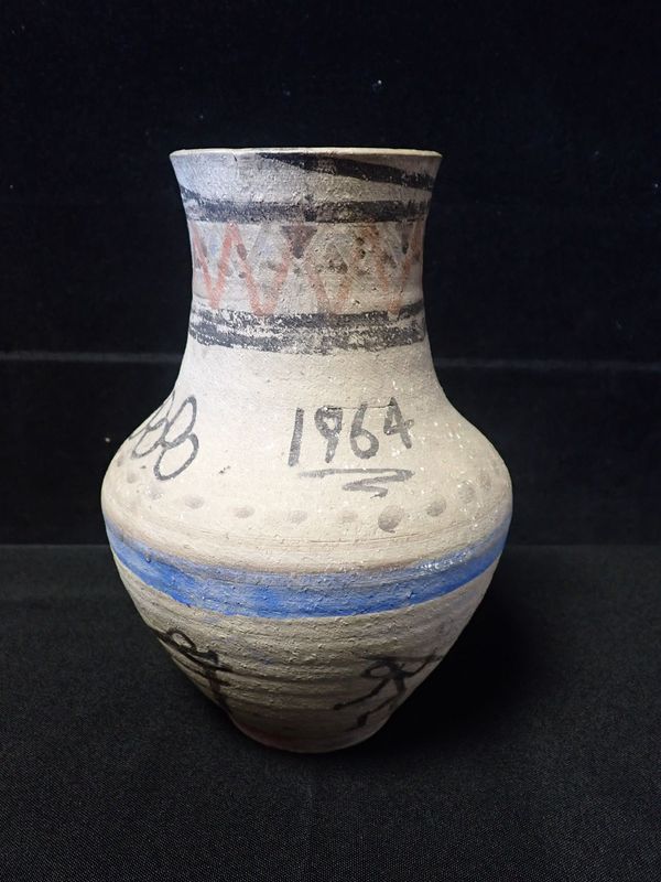 POOLE POTTERY: AN EARLY UNGLAZED CARTER'S VASE LATER DECORATED FOR THE 1964  OLYMPICS