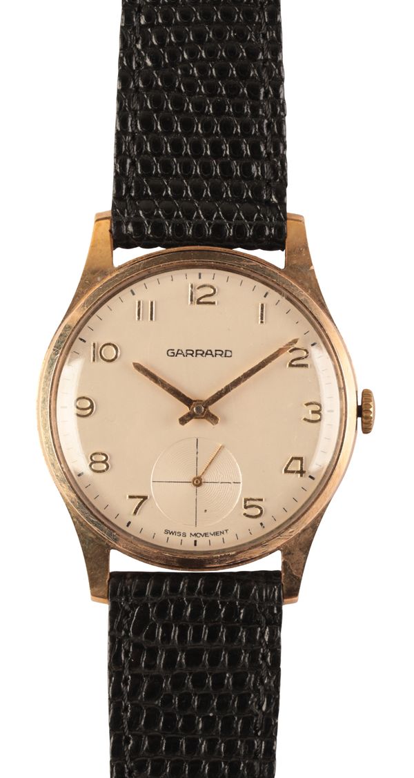 GARRARD: A GENTLEMAN'S 9CT GOLD WRISTWATCH