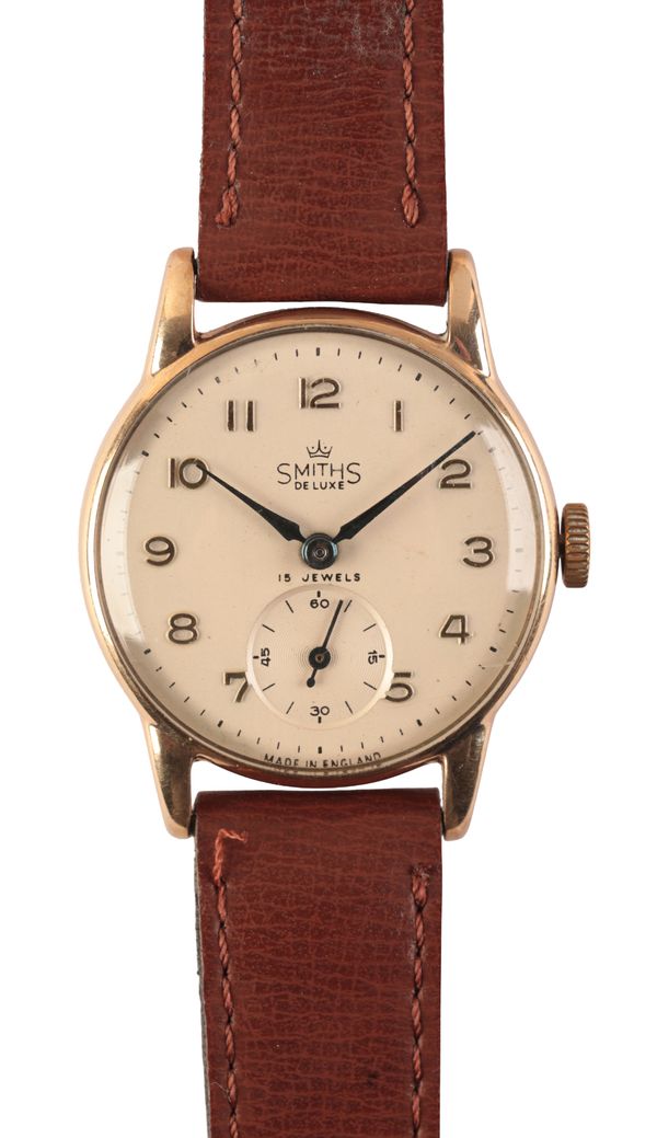 SMITHS DELUXE: A GENTLEMAN'S 9CT GOLD WRISTWATCH