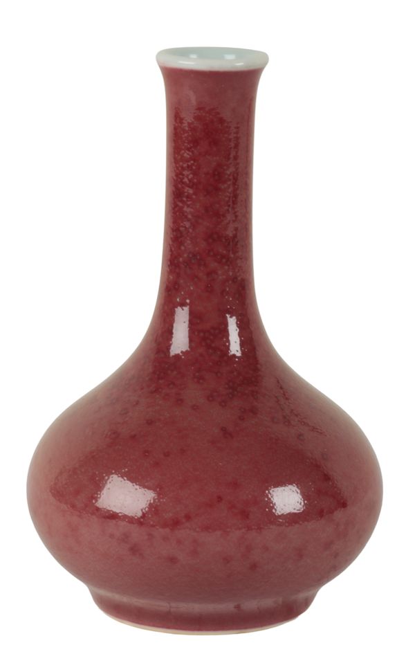 A CHINESE PORCELAIN SMALL COPPER RED GLAZED VASE