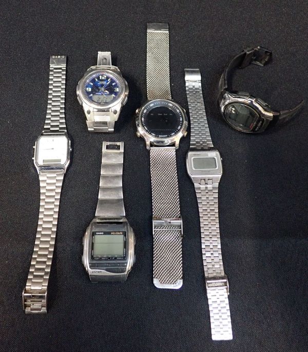 A COLLECTION OF DIGITAL WATCHES