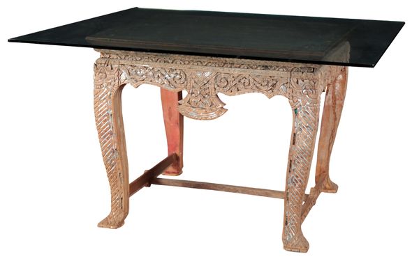 A CARVED AND PAINTED HARDWOOD TABLE