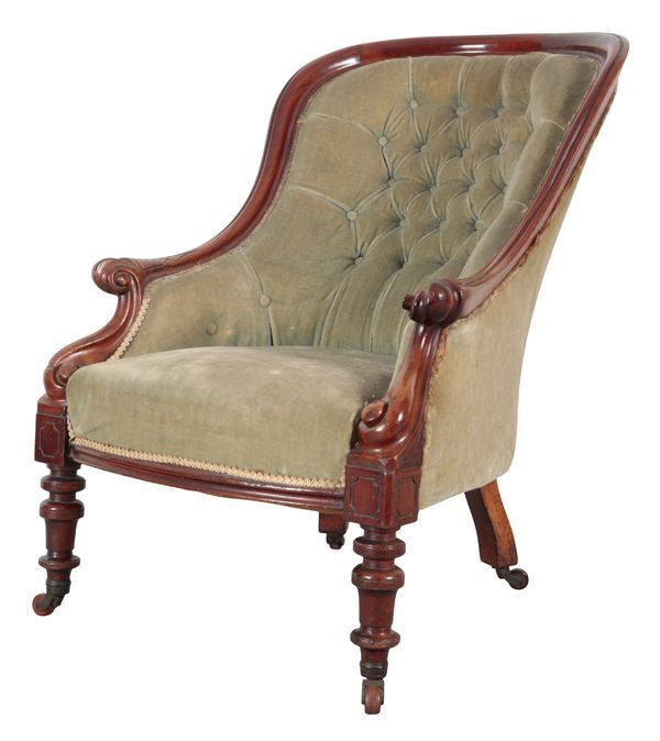 A VICTORIAN MAHOGANY FRAMED BUTTON BACK ARMCHAIR