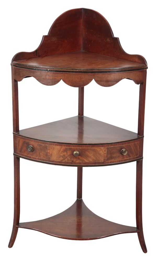 A GEORGE III MAHOGANY BOWFRONT CORNER WASHSTAND