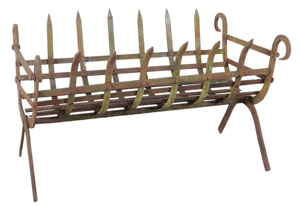 A WROUGHT IRON FIRE GRATE