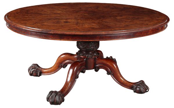 A VICTORIAN BURR WALNUT AND ROSEWOOD OVAL BREAKFAST TABLE