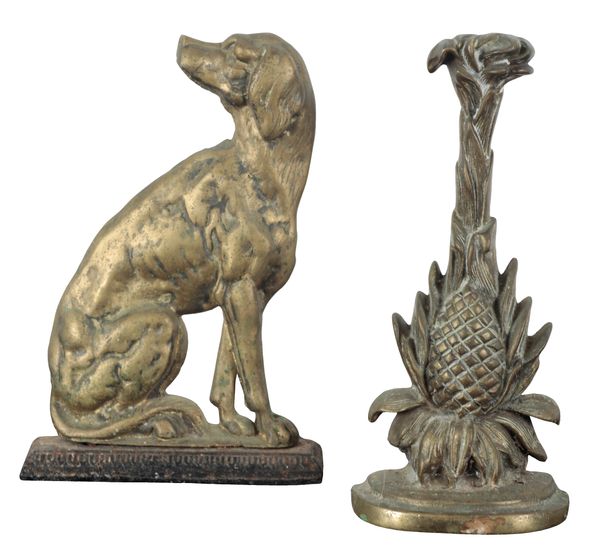 A BRASS DOORSTOP IN THE FORM OF A HOUND