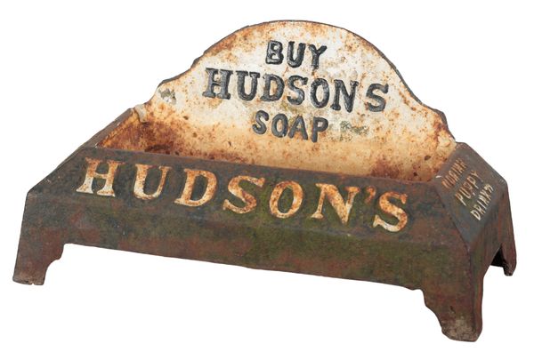 A VINTAGE CAST IRON WATER BOWL BY HUDSON'S SOAP