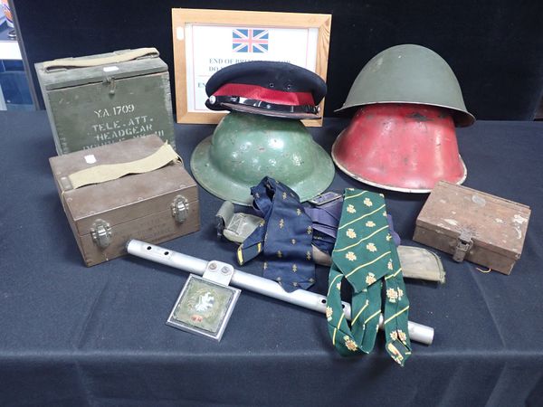 A COLLECTION OF MILITARIA , INCLUDING HELMETS