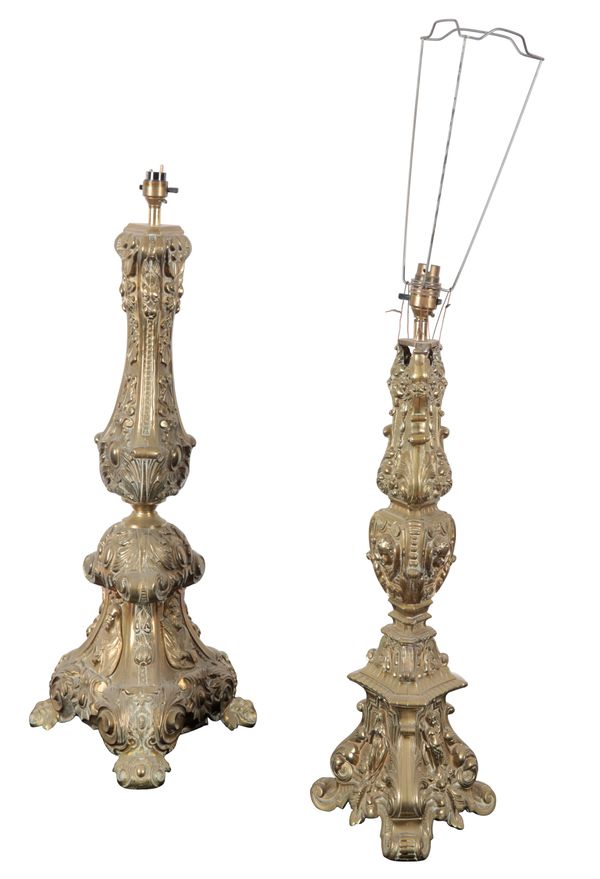 TWO SIMILAR CONTINENTAL BRASS ALTAR LAMPS