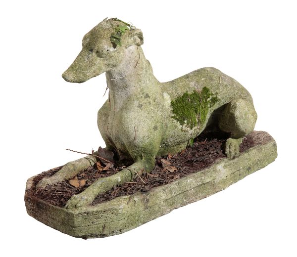 A RECONSTITUTED STONE GREYHOUND