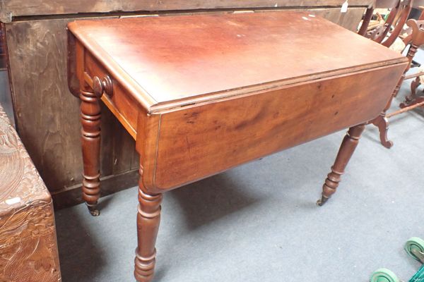 A VICTORIAN MAHOGANY DROP-LEAF TABLE