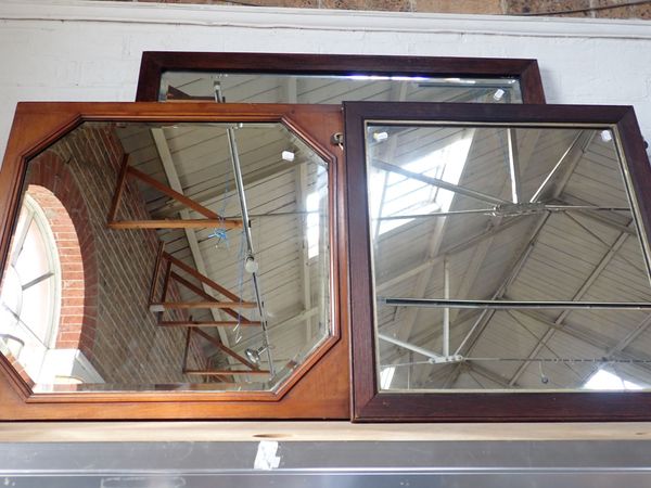 A 1920S OAK-FRAMED WALL MIRROR, WITH BEVELLED PLATE