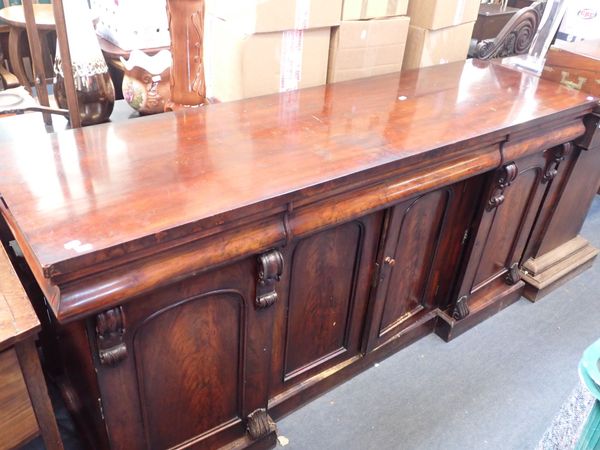 A VICTORIAN FIGURED MAHOGANY SIDEBOARD