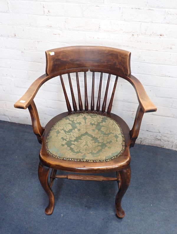 A 1920S STAINED BEECH OFFICE ARMCHAIR