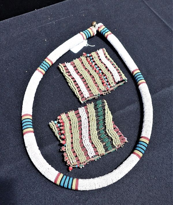 A  NORTH AFRICAN BEAD NECKLACE AND BEADED CUFFS