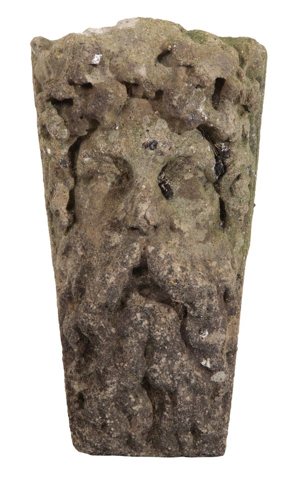 A RECONSTITUTED STONE HEAD