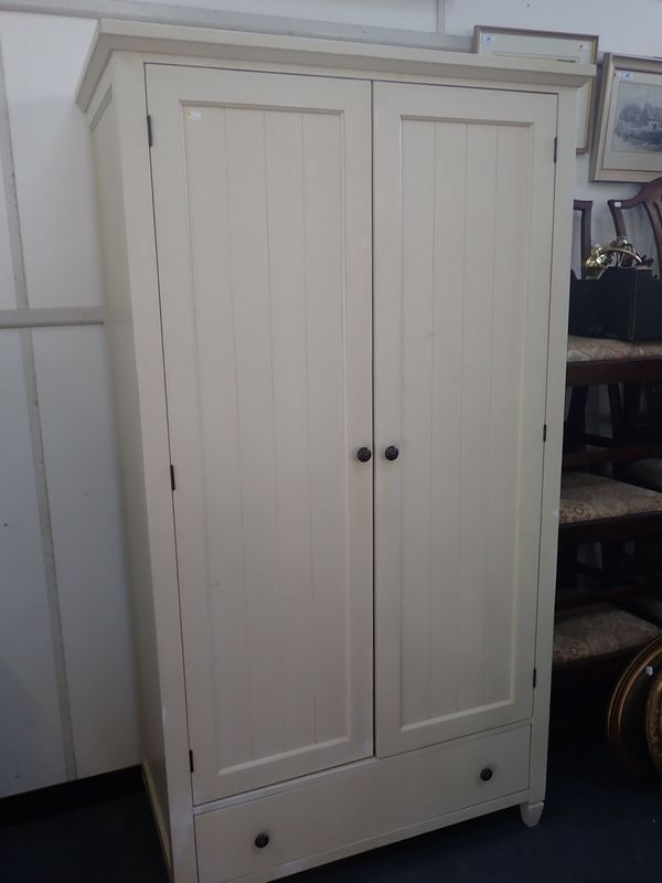 A MODERN WHITE PAINTED WARDROBE