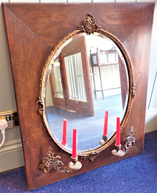 AN EDWARDIAN  WALL MIRROR WITH OVAL PLATE