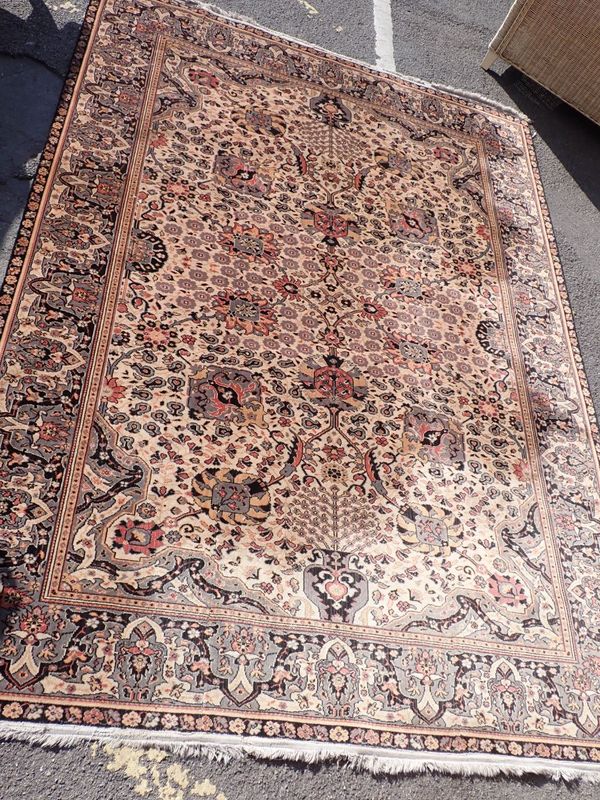 A PERSIAN DESIGN RUG