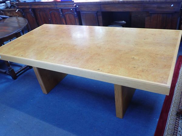 A  HEAL'S MODERN LIGHT OAK AND BURR VENEERED DINING TABLE