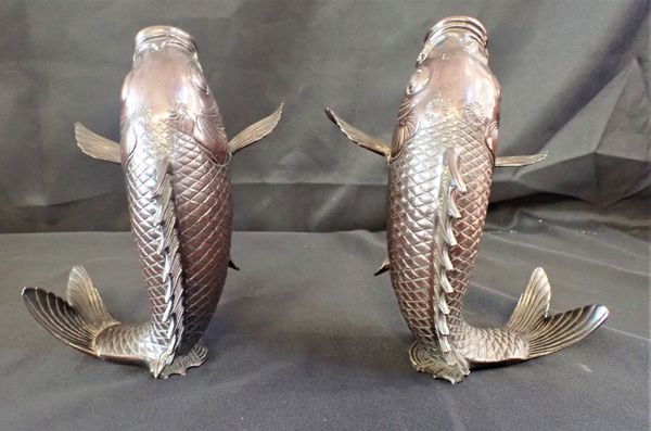 A NEAR PAIR OF JAPANESE BRONZE CARP