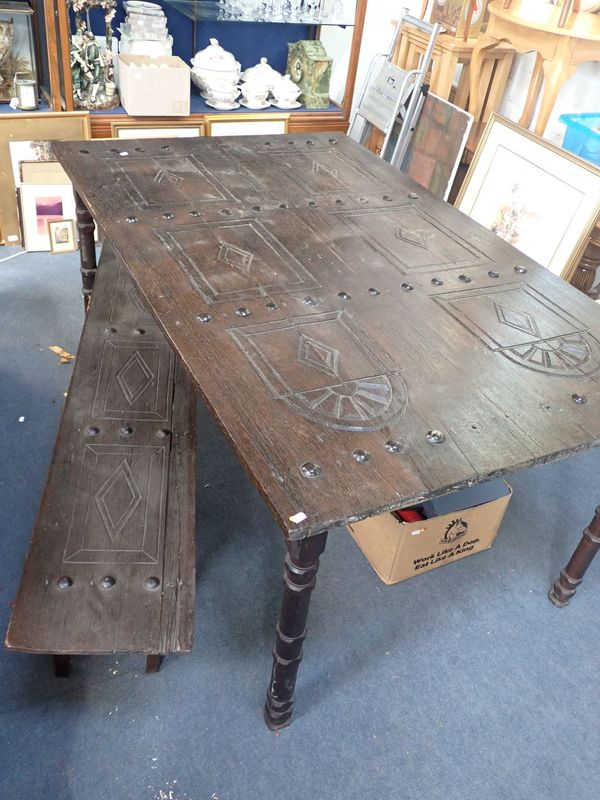 A LARGE OAK TABLE, MADE FROM AN ARCADED DOOR