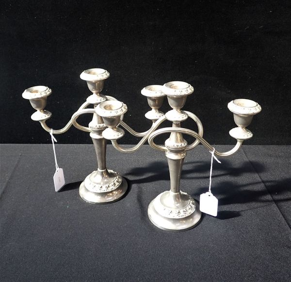 A PAIR OF PLATED CANDELABRA