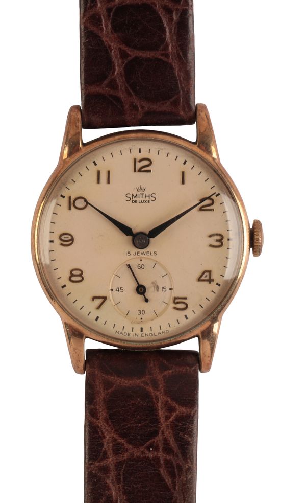 SMITHS DELUXE: A GENTLEMAN'S 9CT GOLD WRISTWATCH