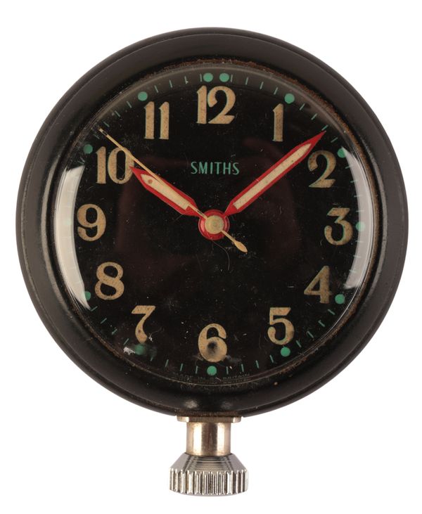 A SMITHS BAKERLITE CAR CLOCK