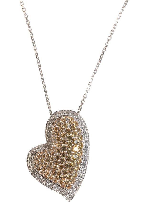 AN 18K WHITE GOLD YELLOW AND WHITE DIAMOND HEART SHAPED PENDANT