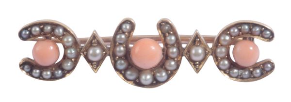 A CORAL AND SEED PEARL STOCK PIN