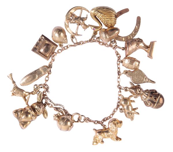 A 9CT GOLD CHARM BRACELET