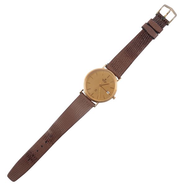 MARVIN: A GENTLEMAN'S 9CT GOLD WRISTWATCH