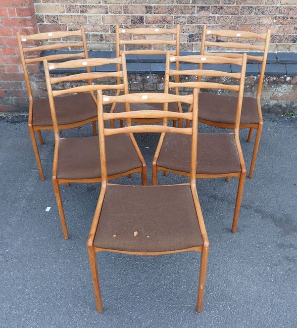 A SET OF SIX MID-CENTURY MODERN TEAK DINING CHAIRS, OF DANISH STYLE