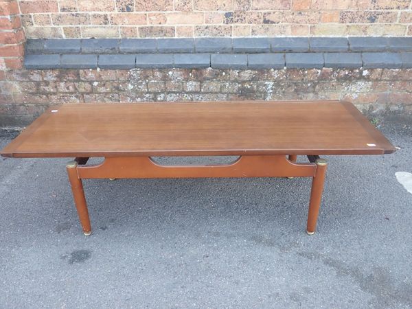 A MID-CENTURY MODERN TEAK TOPPED COFFEE TABLE