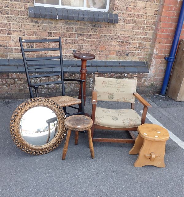 A MODERN EBONISED RUSH-SEATED ROCKING CHAIR