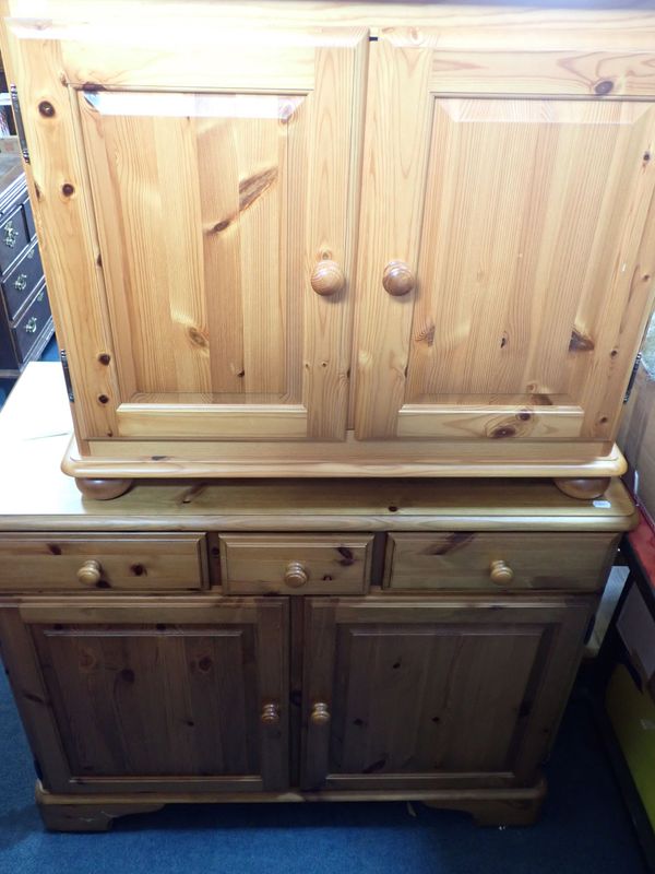 A PINE TWO-DOOR LOW CUPBOARD, AND SIMILAR SIDEBOARD