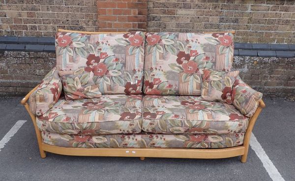 AN ERCOL ELM 'RENAISSANCE' SOFA